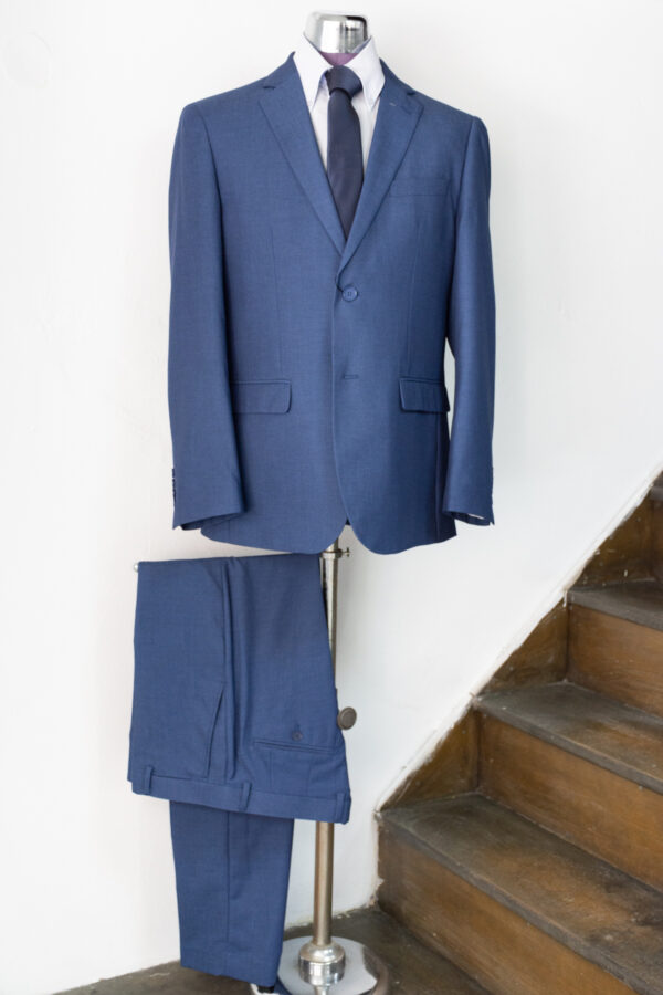Suit with a small design