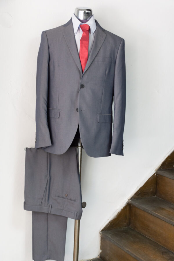 Suit with a small design